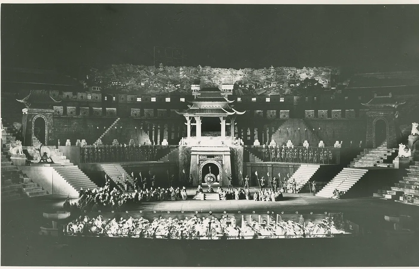 A black-and-white panorama of the arena set for a performance