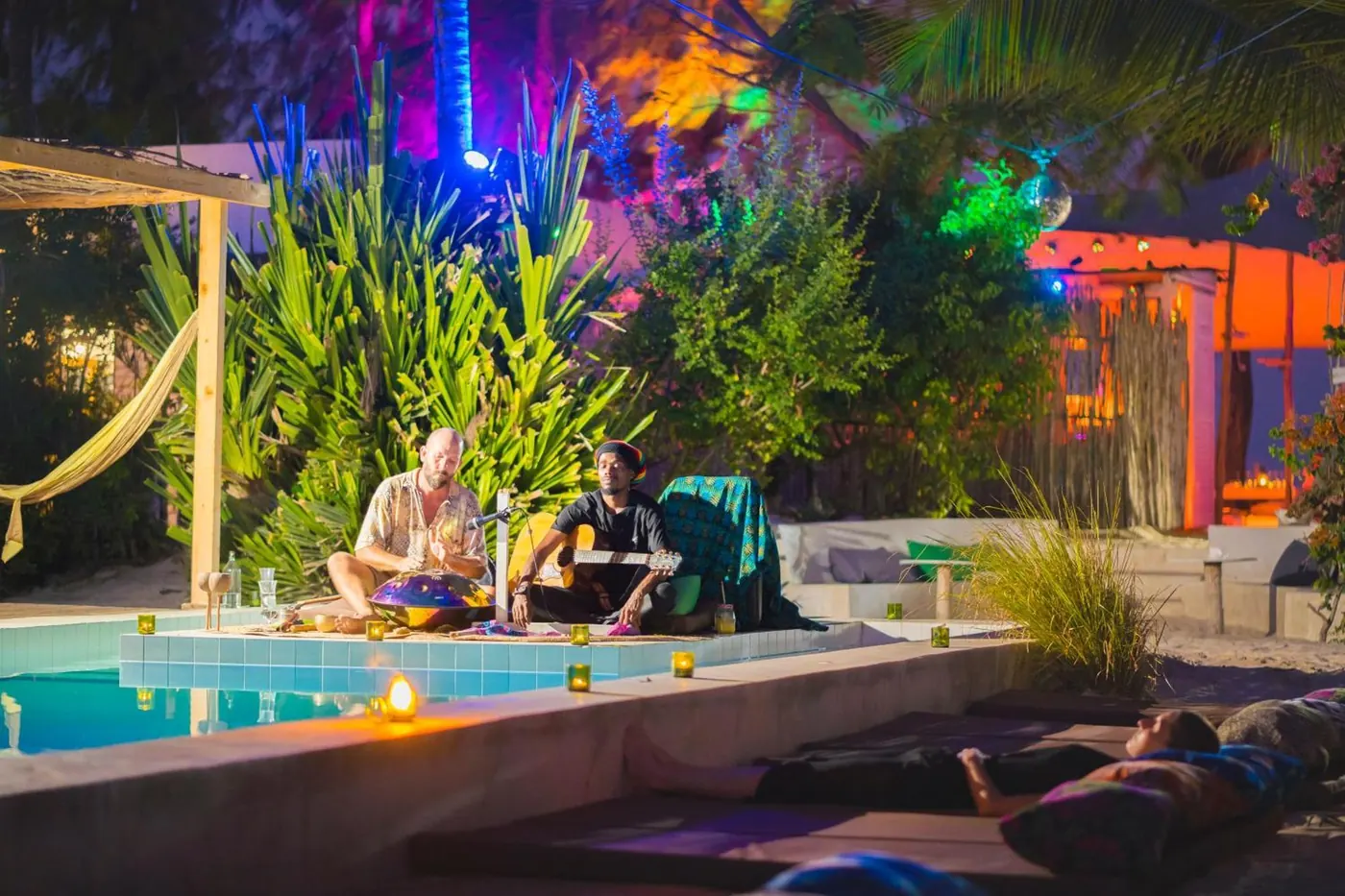 The B4 Beach poolside lounge under coloured lights