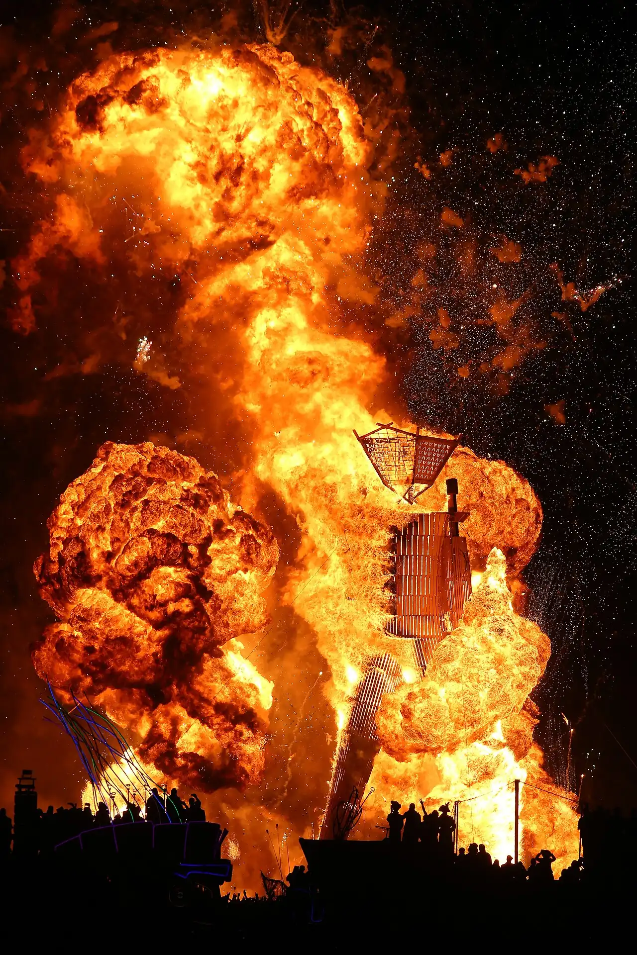 A column of flame at night