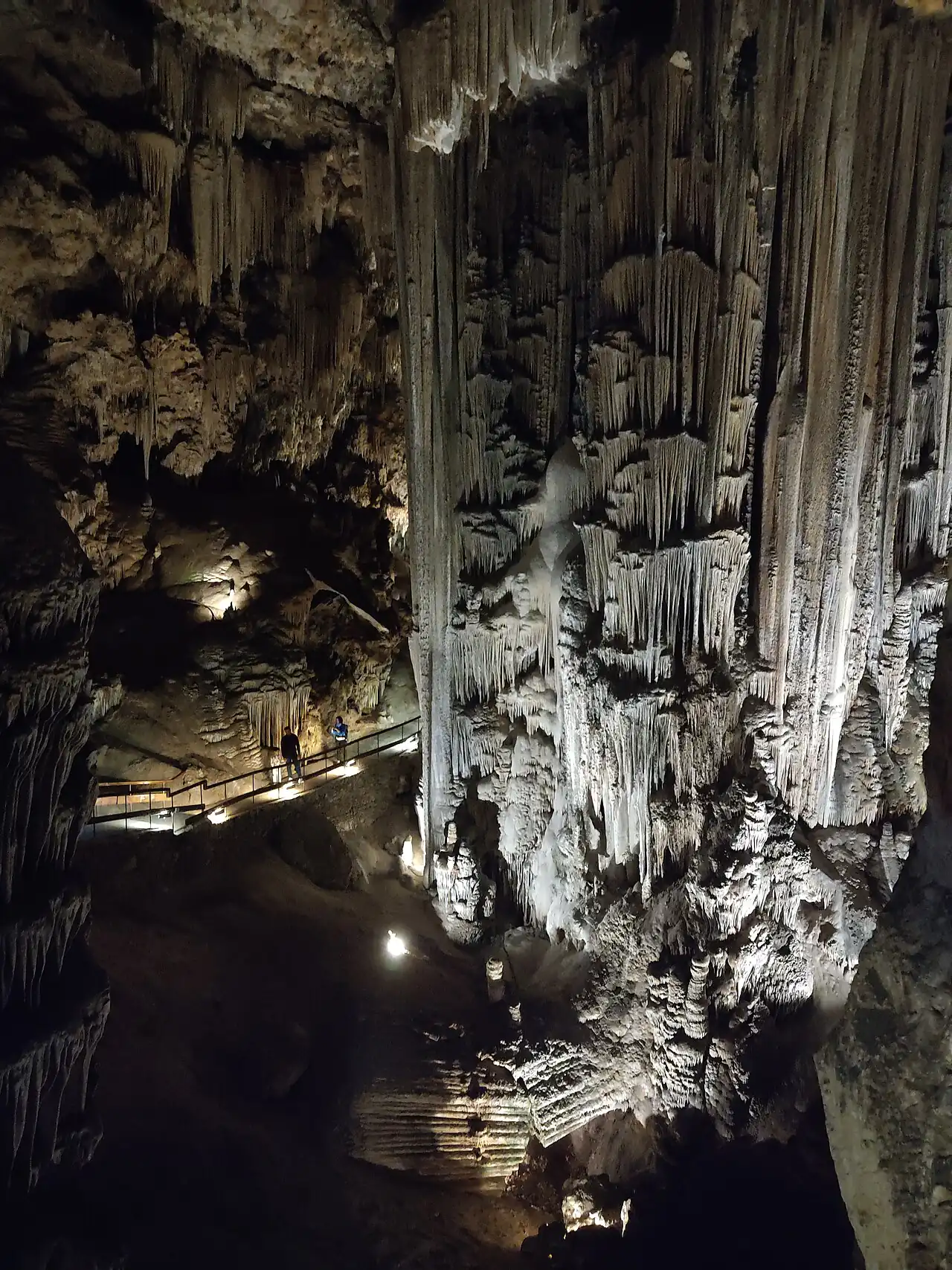 A tall stone column in the cave