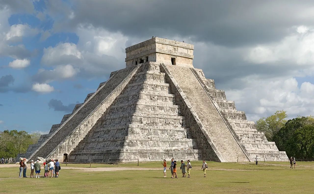 The stepped pyramid seen across the grass