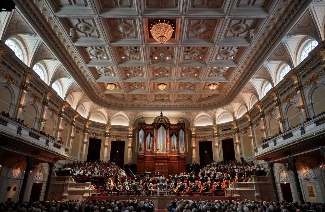 The coffered ceiling and organ of the Concertgebouw Main Hall above a full house