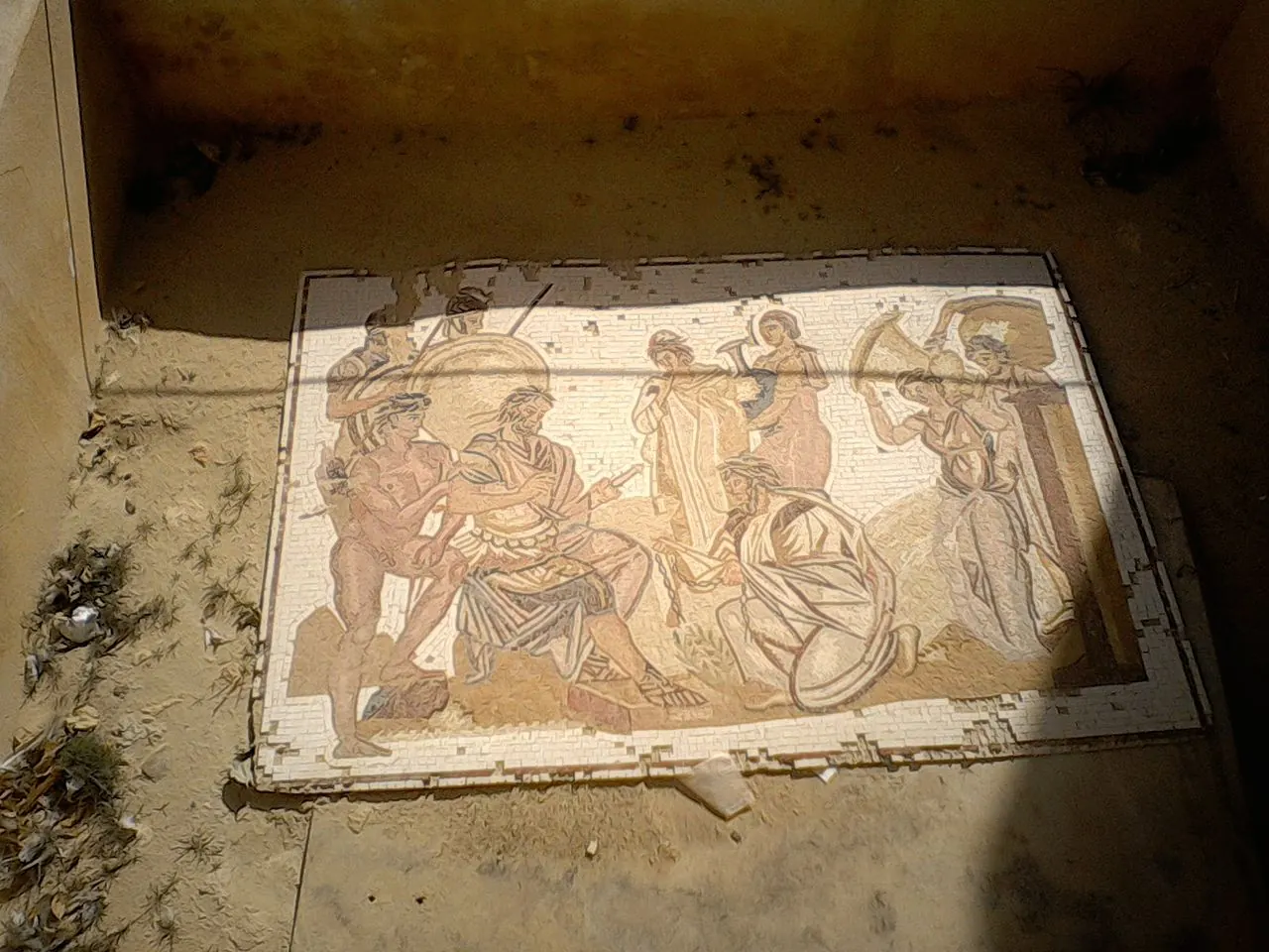 A Roman floor mosaic in a sunken excavation