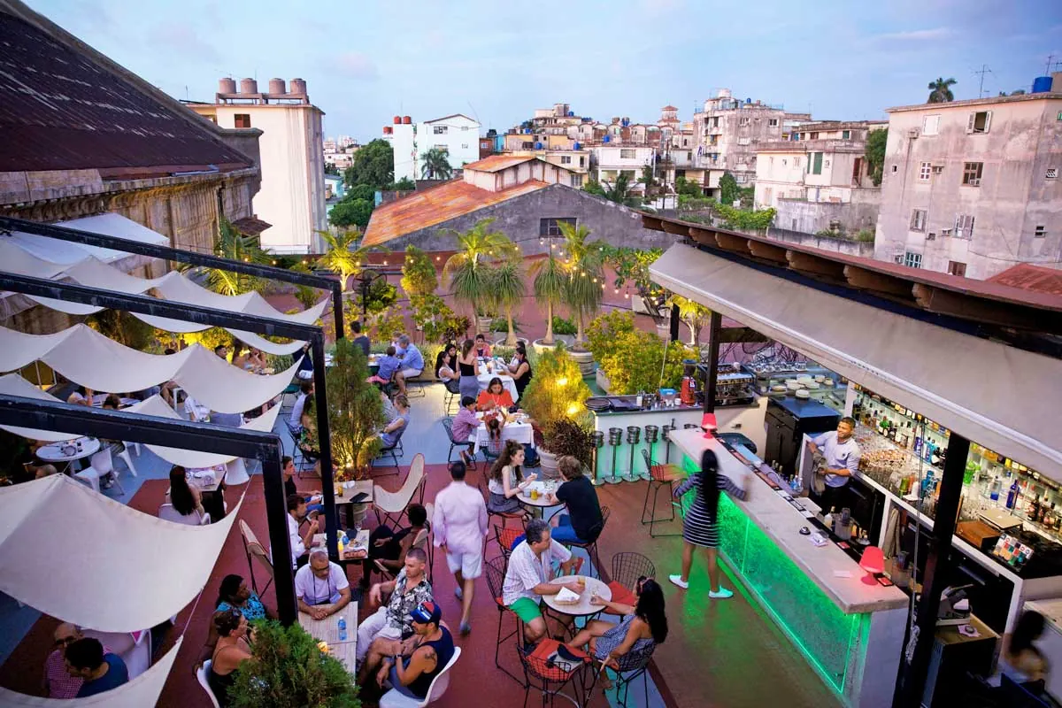 A rooftop bar and dining terrace above the street
