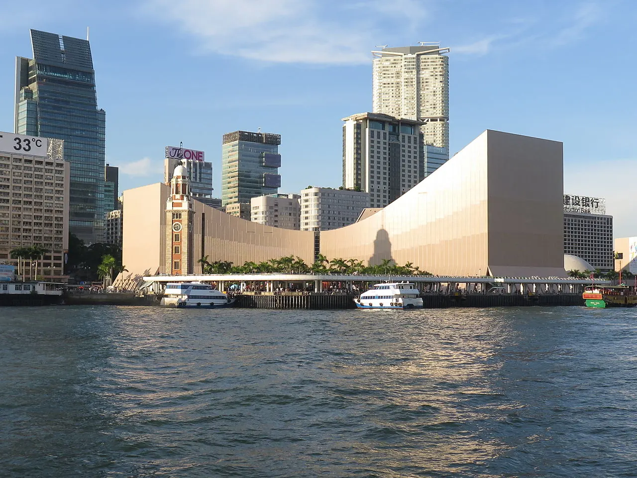 The Cultural Centre's sloping white roof seen from the harbour