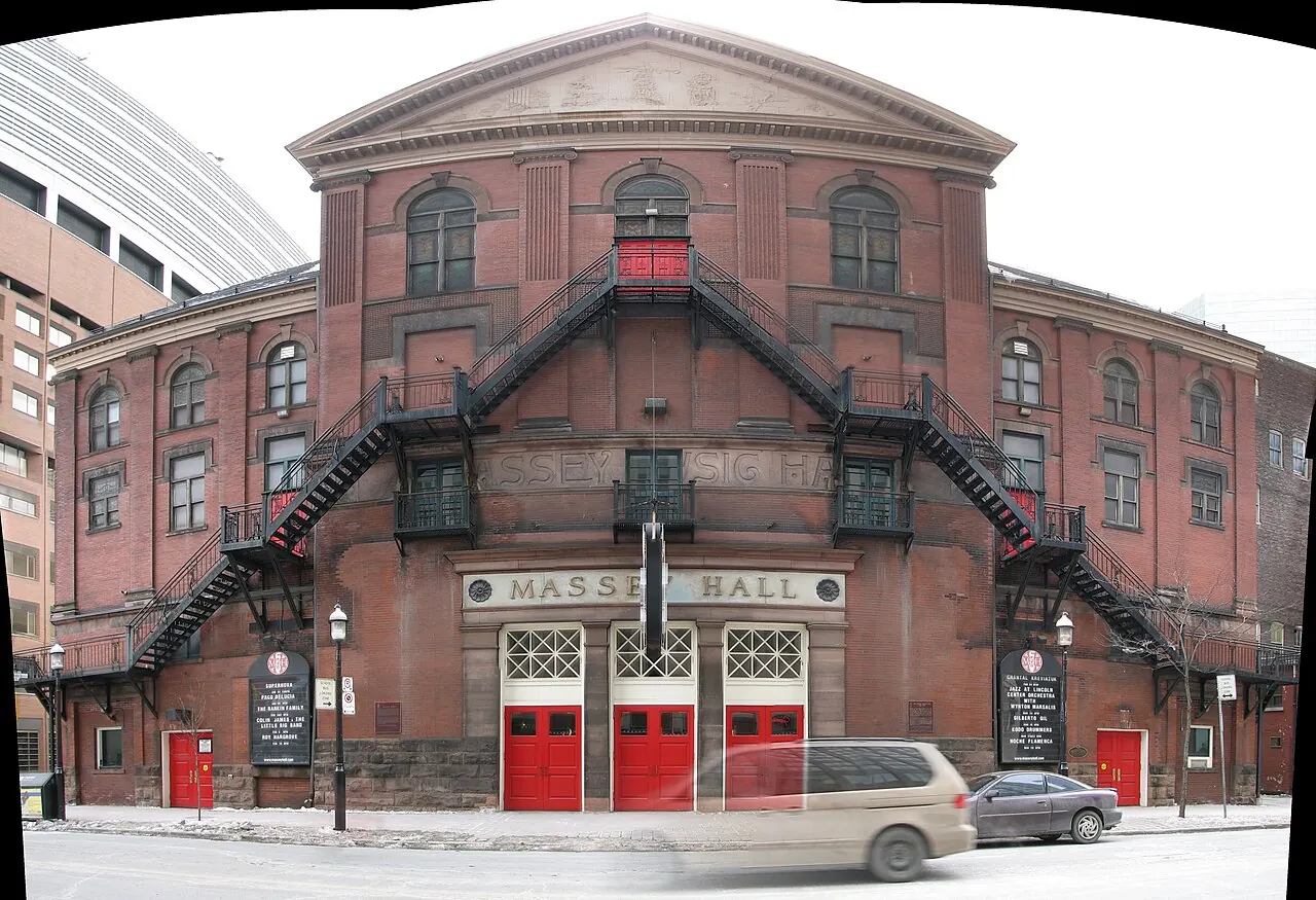 The front of Massey Hall with red fire-escape doors