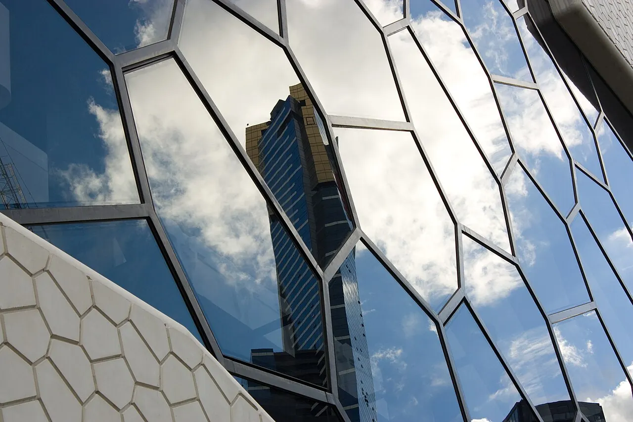 Reflective faceted glass on the building
