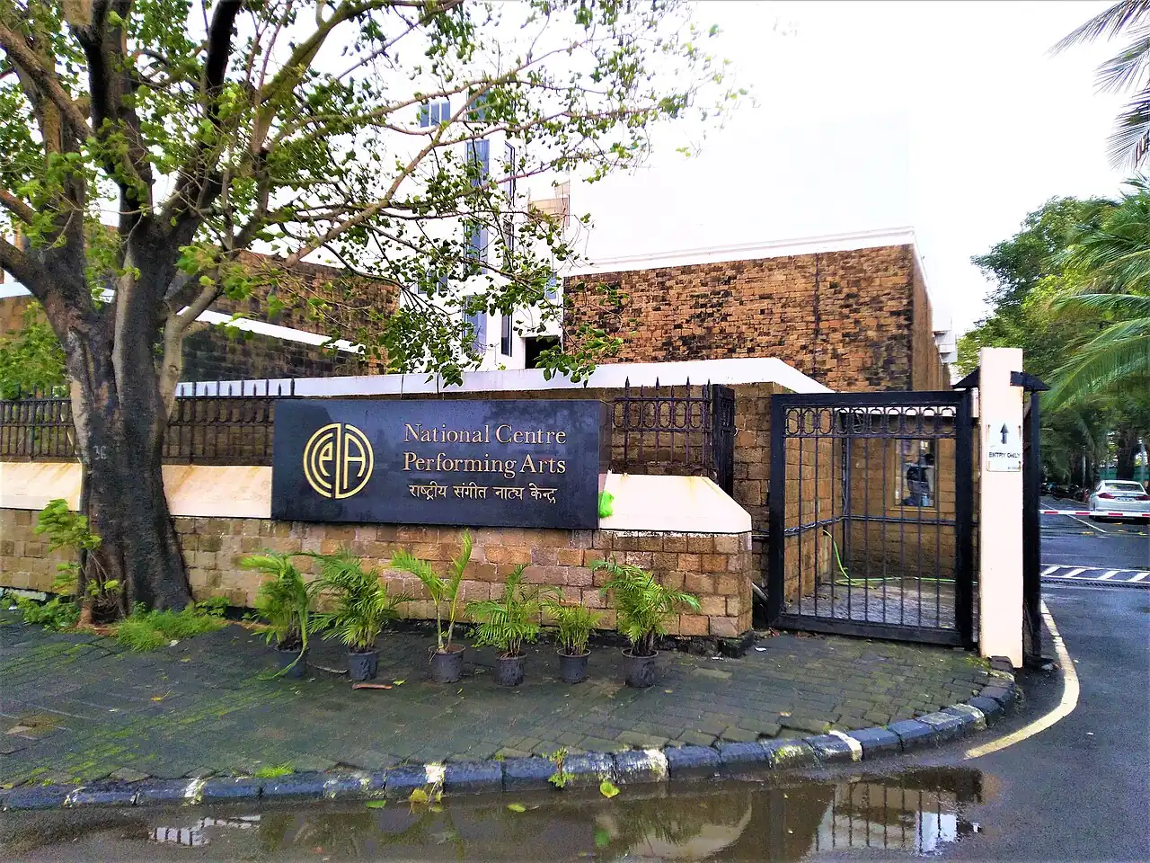 The NCPA sign at the gate among trees