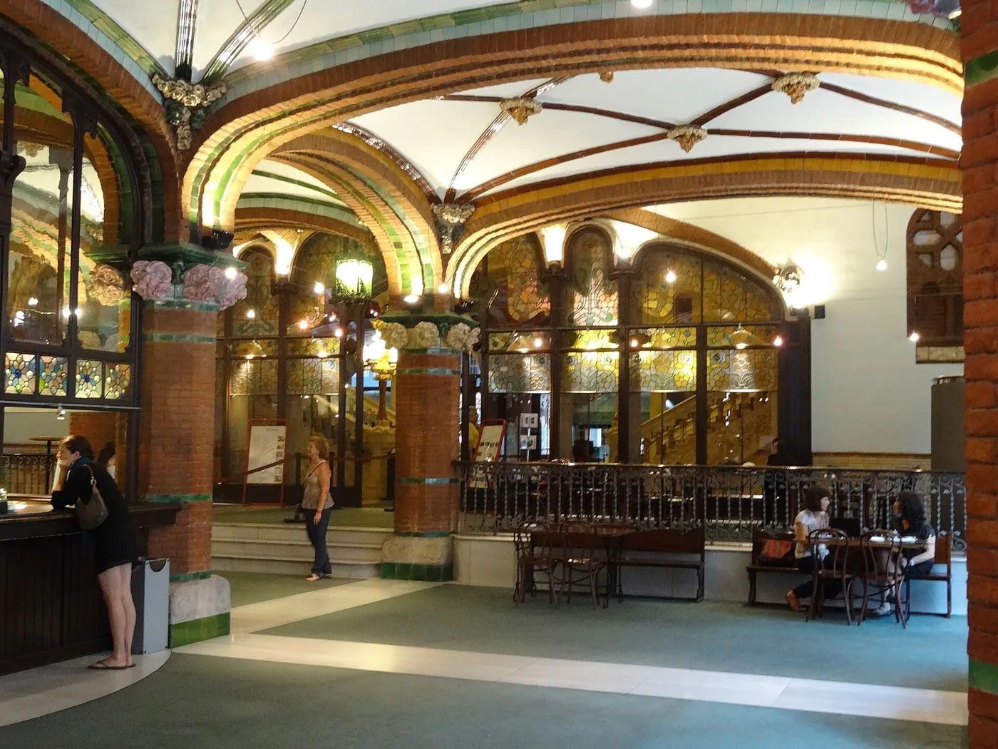 The gilded arches of the Palau's foyer bar