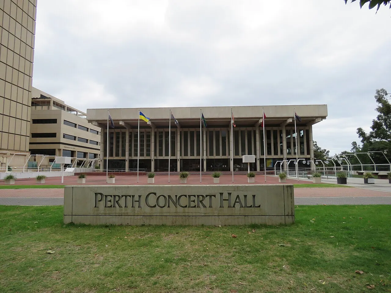 The Perth Concert Hall sign on a lawn in front of the building
