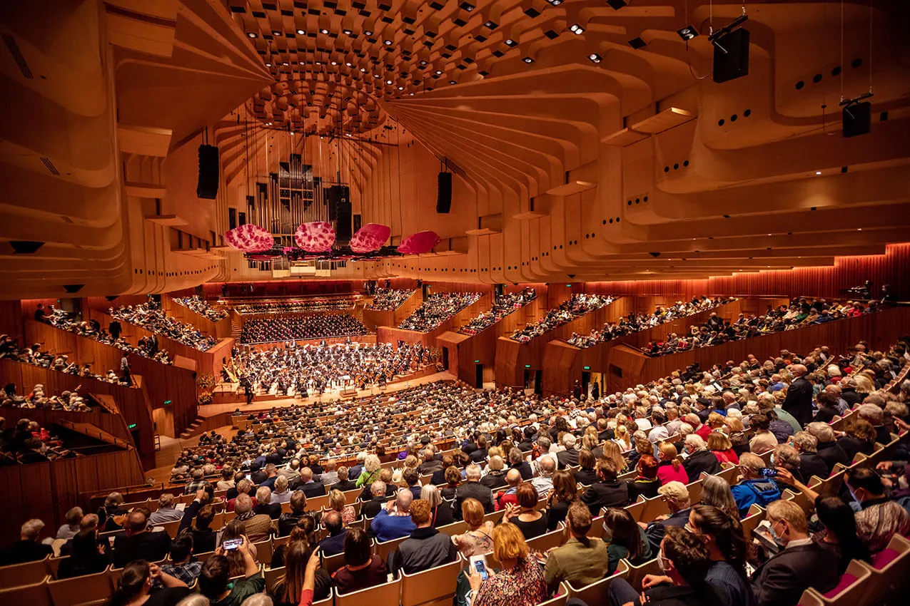 The Concert Hall of the Sydney Opera House with an audience filling the seats