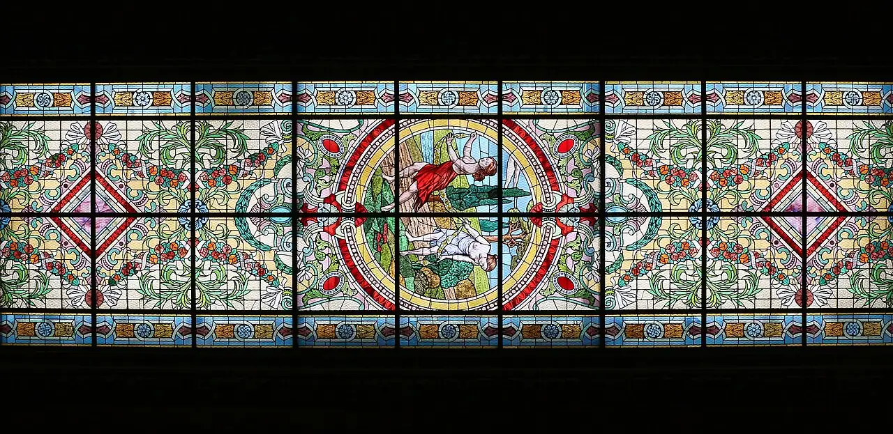 A stained-glass ceiling panel lit from above