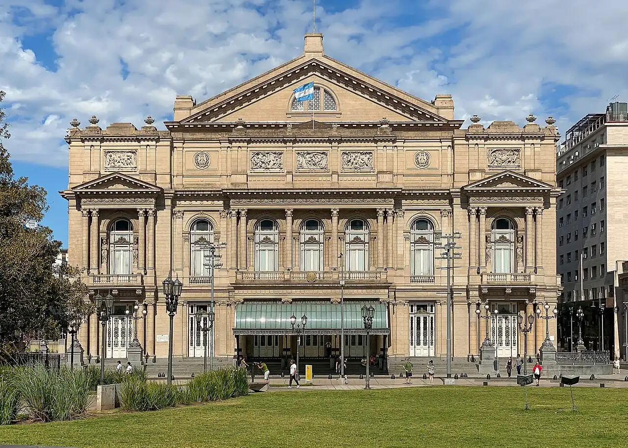 The Teatro Colón facade across a green lawn