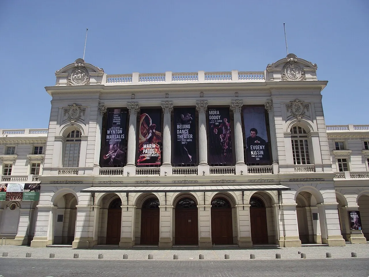 The theatre facade seen across the plaza