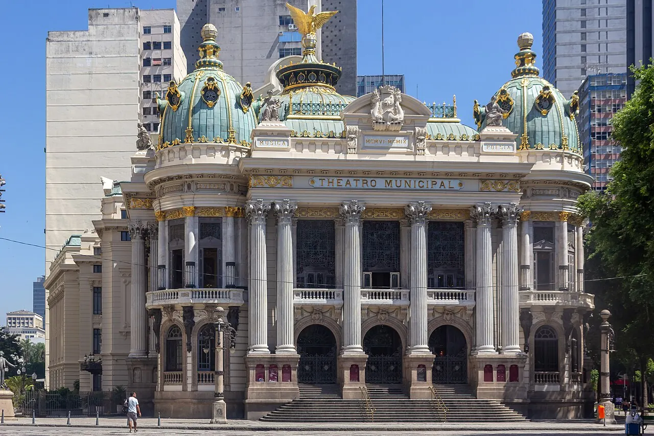 The theatre's columns and green domes