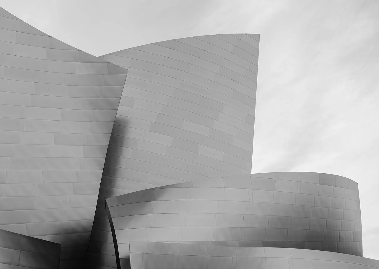 A black-and-white close view of the steel curves