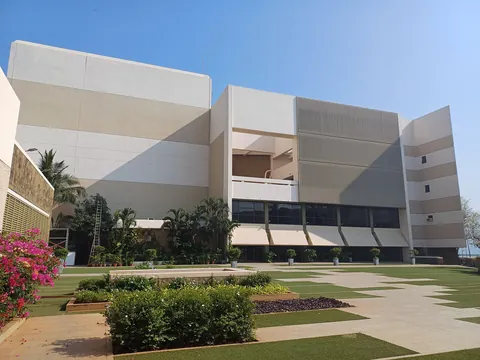 The pale, blocky exterior of the National Centre for the Performing Arts in Mumbai