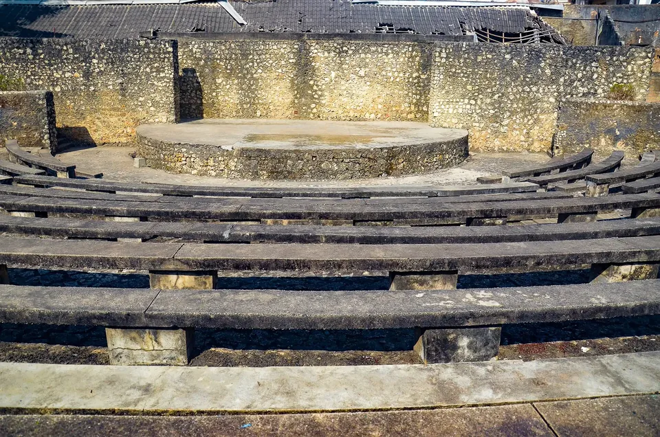 The empty stone tiers and round stage of the Old Fort amphitheatre in Stone Town