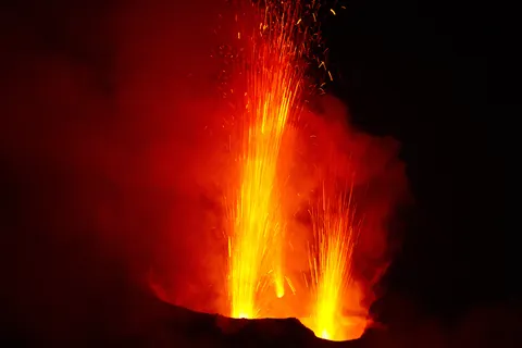 Lava fountaining from Stromboli's crater at night