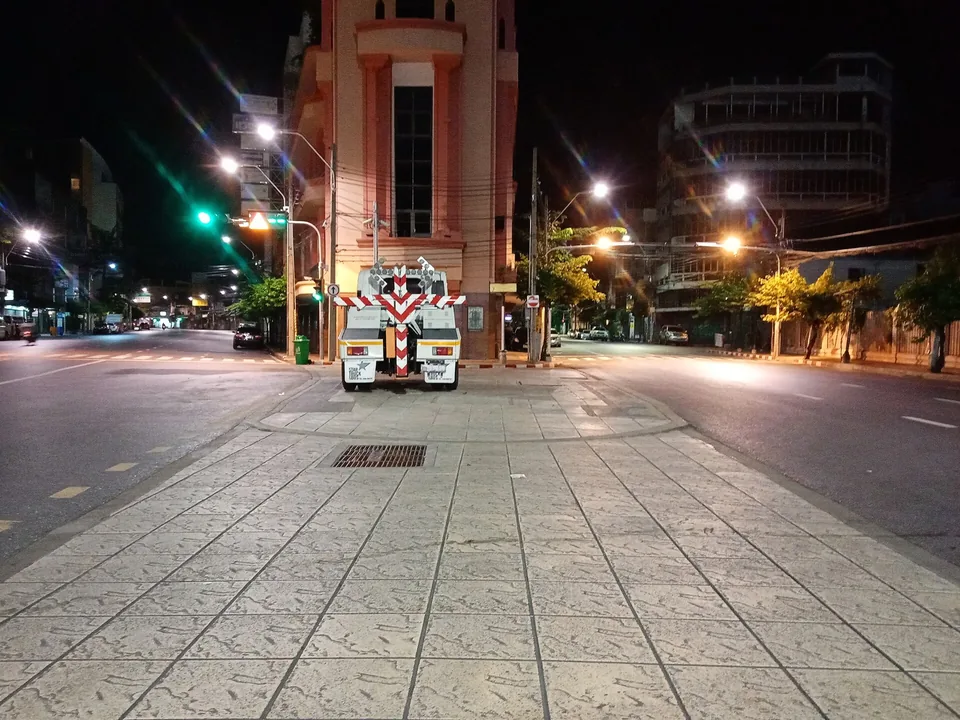 A street corner between Yaowarat and Charoen Krung Road at night, Bangkok