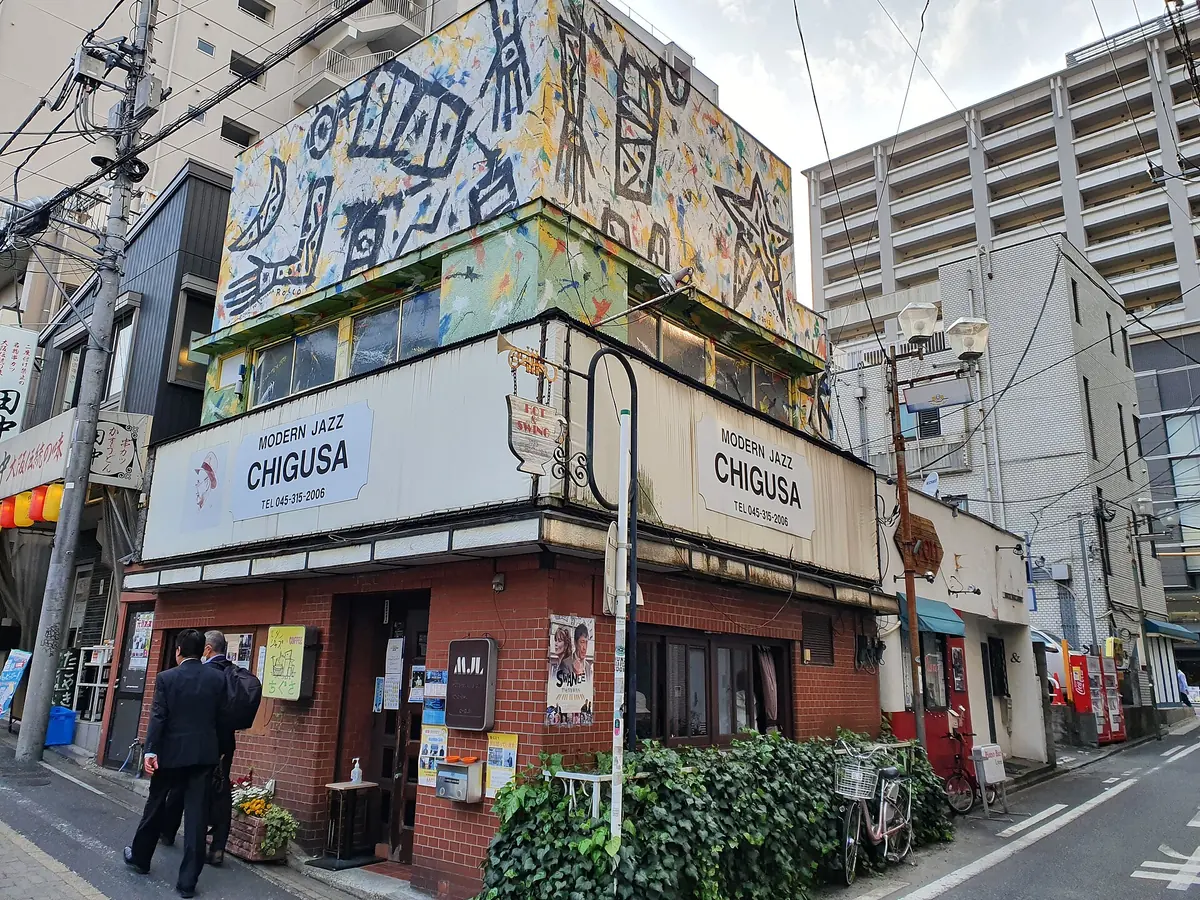 The Chigusa jazz café on a street corner in Noge, Yokohama, with its Modern Jazz Chigusa sign
