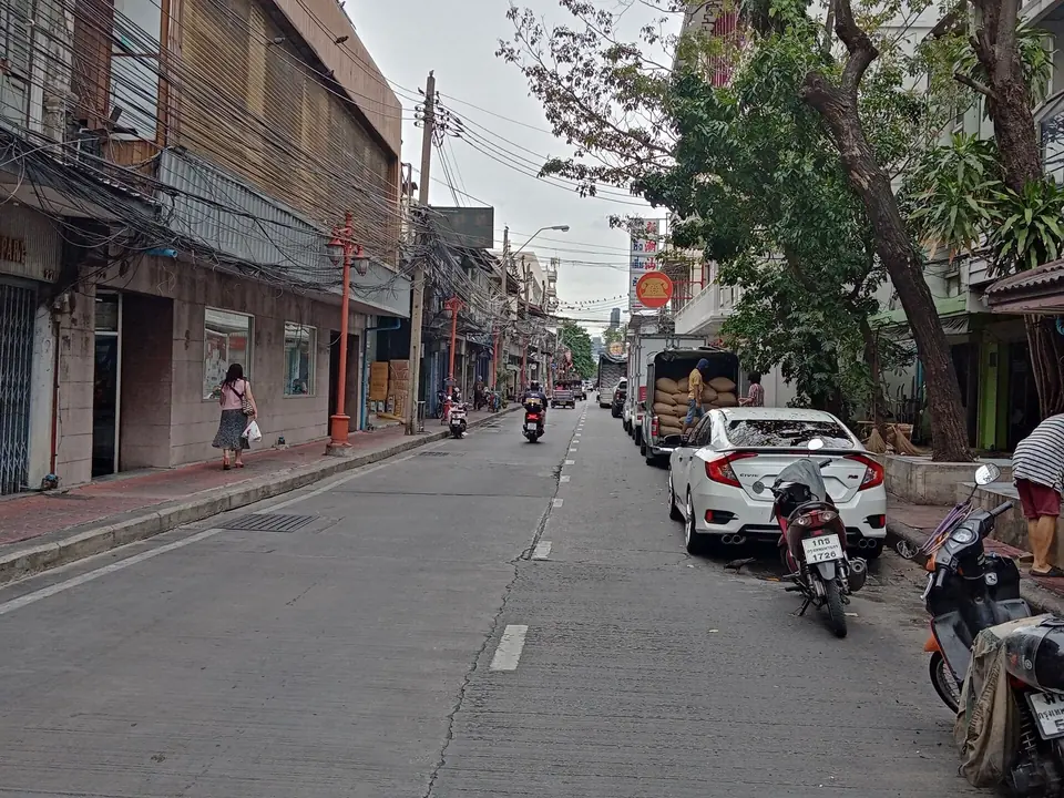 Old shophouses along Song Wat Road, Bangkok, in daylight